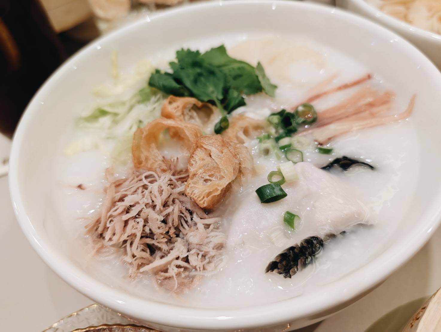 平凡卻不簡單的生滾粥,每一碗都經三小時悉心熬煮。攝影/高麗音